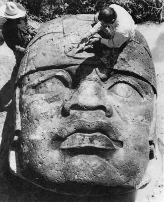Olmec head with excavators